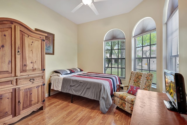 bedroom featuring ceiling fan and light hardwood / wood-style floors