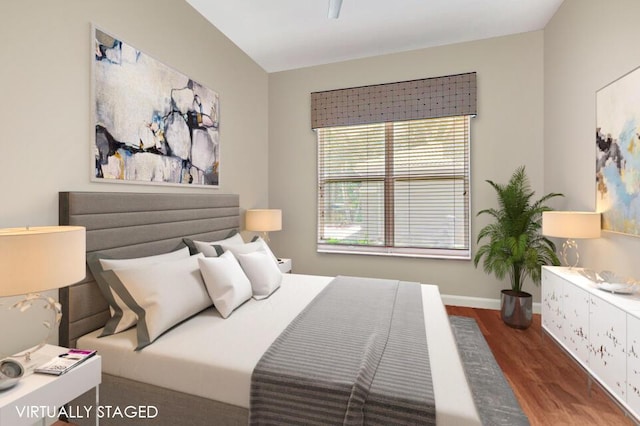 bedroom featuring dark wood-type flooring