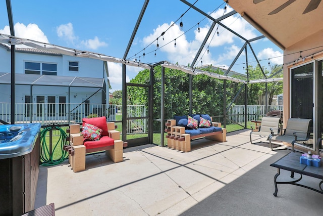 view of patio / terrace with glass enclosure