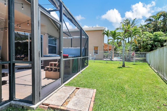 view of yard featuring a lanai