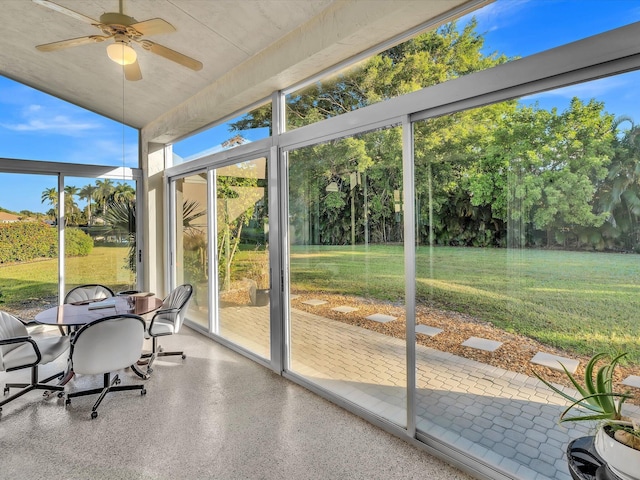 sunroom featuring a wealth of natural light and ceiling fan