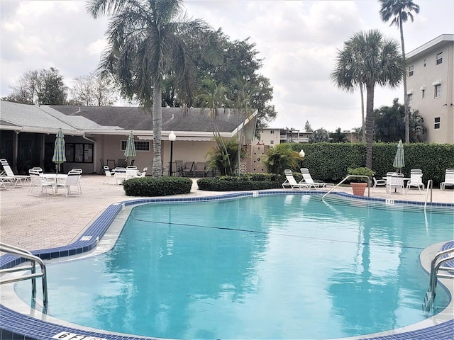 view of pool with a patio area