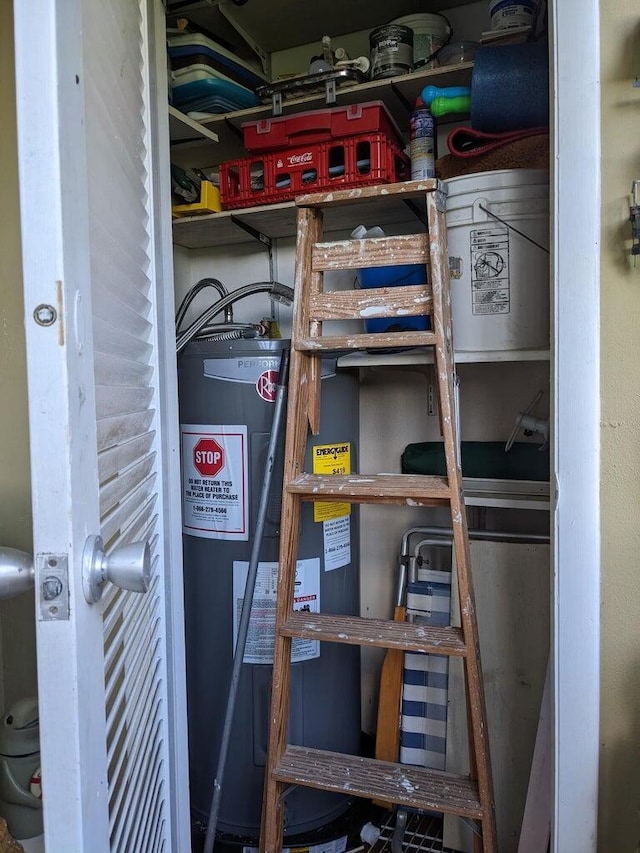 storage room featuring water heater