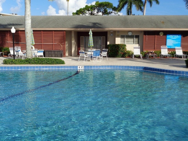 view of pool featuring a patio area