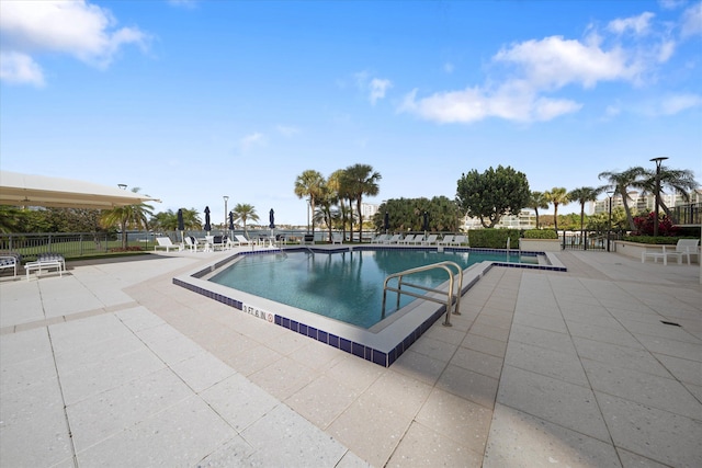 view of pool featuring a patio