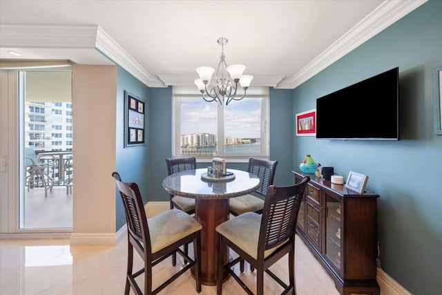 dining area featuring an inviting chandelier and crown molding