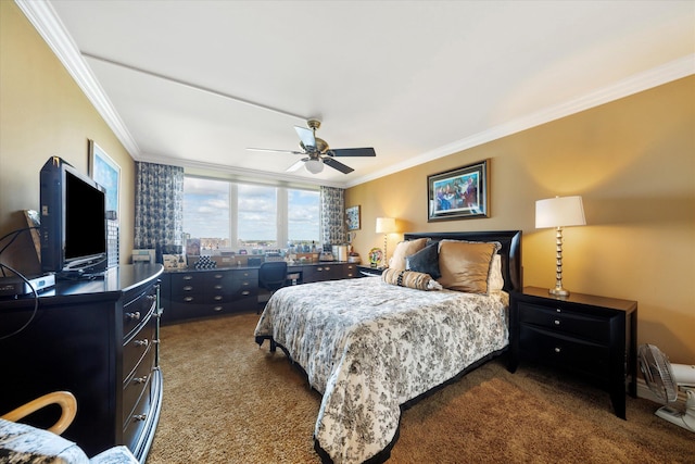 bedroom featuring ceiling fan, crown molding, and dark colored carpet