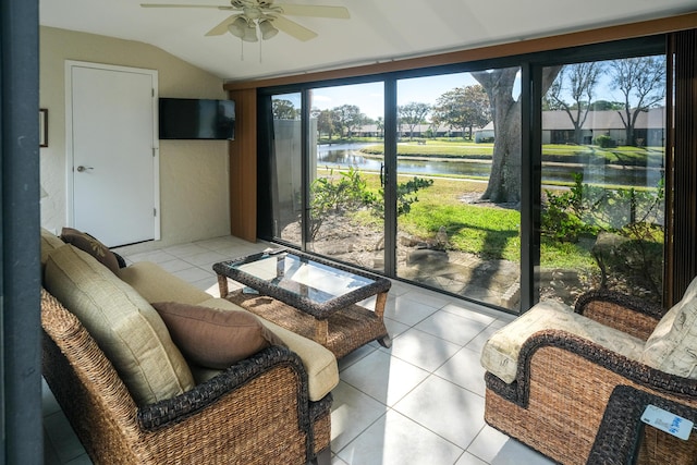 sunroom / solarium featuring ceiling fan and vaulted ceiling