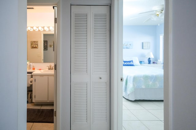 hallway with light tile patterned floors