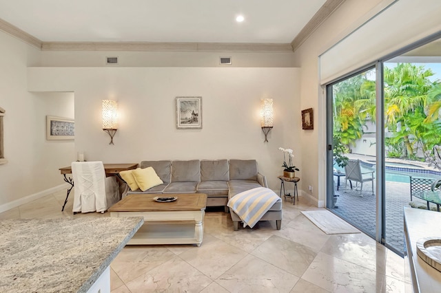 living room featuring crown molding