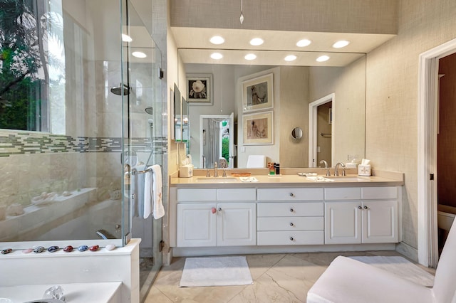 bathroom with vanity and walk in shower