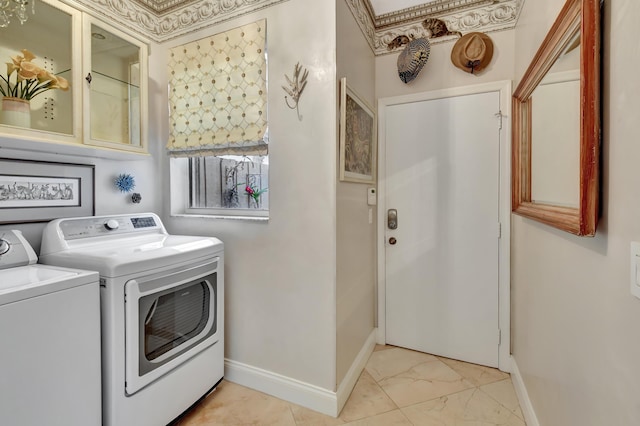 washroom with washer and dryer