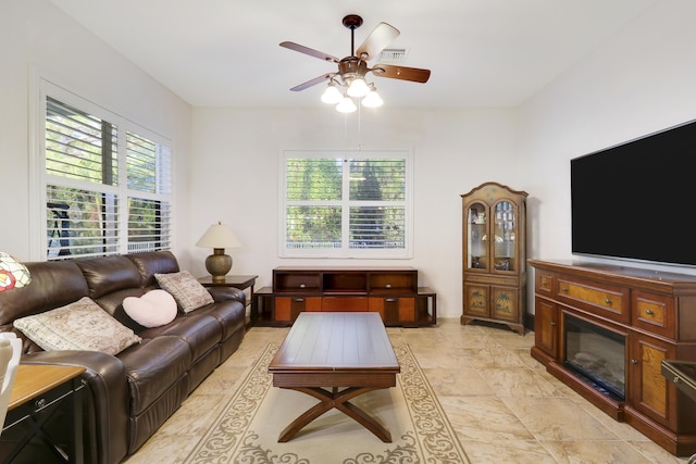 living room featuring ceiling fan