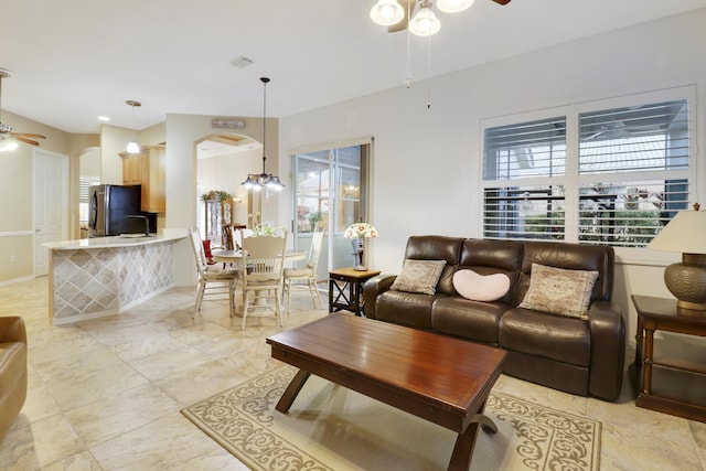 living room featuring ceiling fan