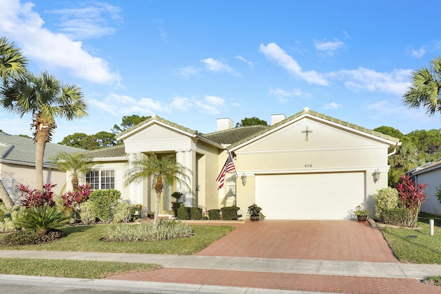 view of front of property featuring a garage