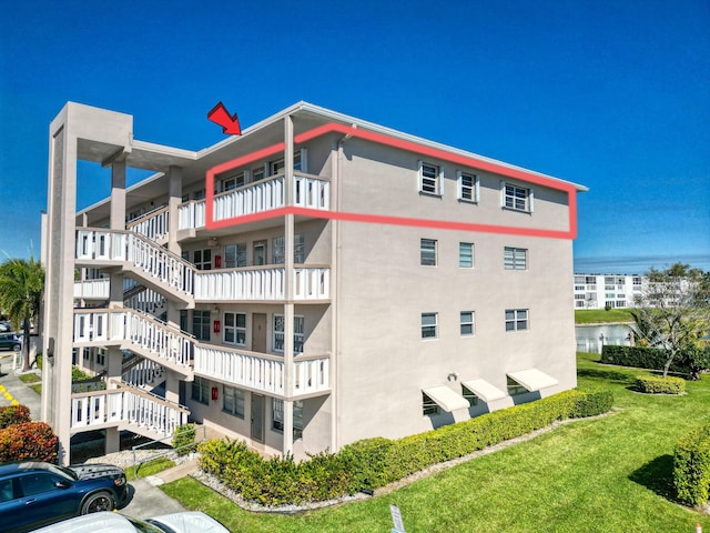 view of building exterior with a water view