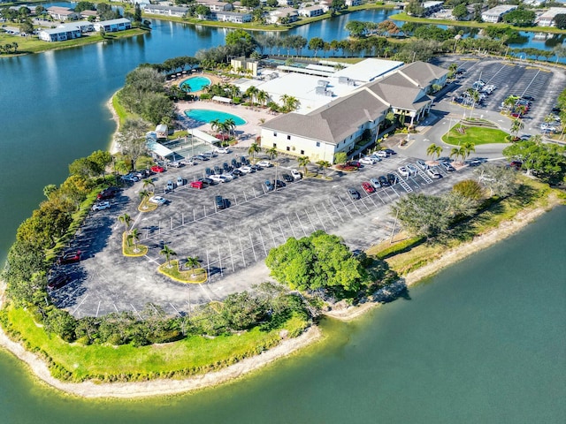 bird's eye view with a water view