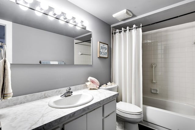 full bathroom with toilet, vanity, and shower / bath combination with curtain