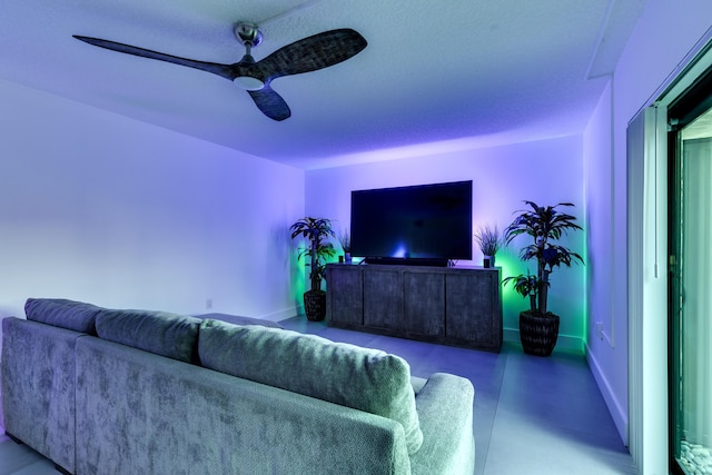 living room featuring ceiling fan