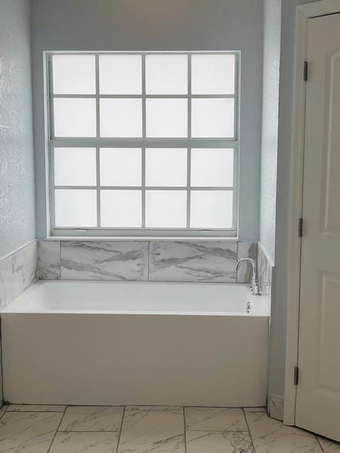 bathroom with a bathtub