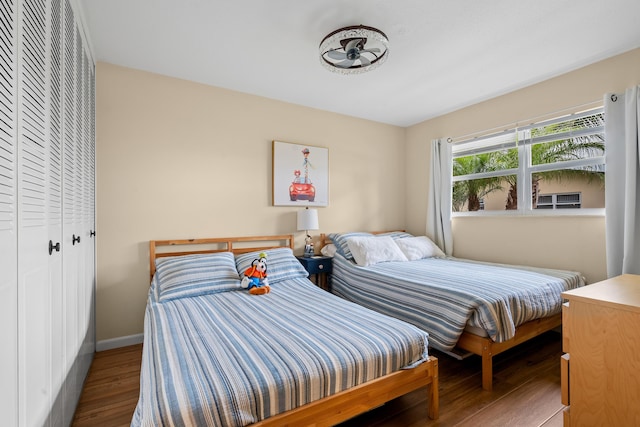 bedroom with hardwood / wood-style floors