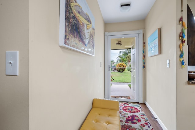 doorway to outside with hardwood / wood-style floors