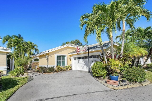 view of front of property with a garage