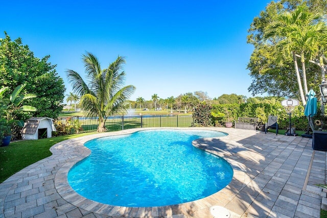 view of swimming pool with a patio