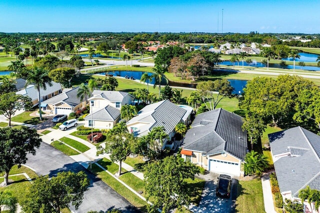 drone / aerial view with a water view