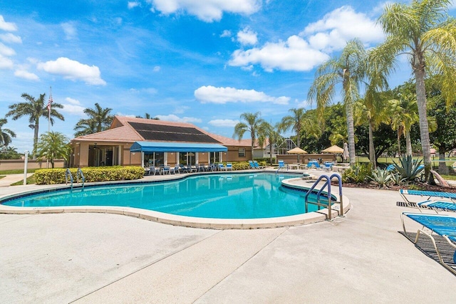 view of pool featuring a patio area