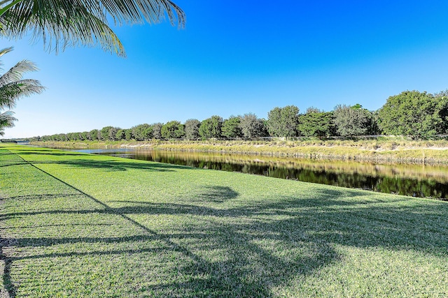 view of yard with a water view