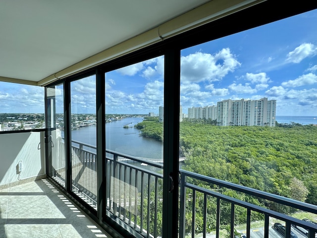 balcony featuring a water view