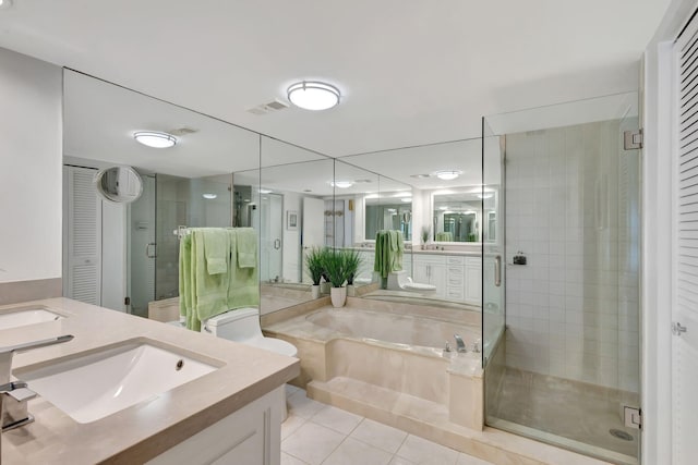 bathroom featuring tile patterned floors, vanity, and independent shower and bath