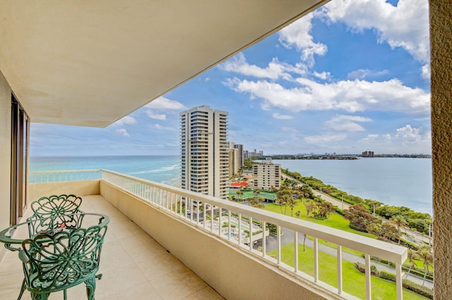 balcony featuring a water view