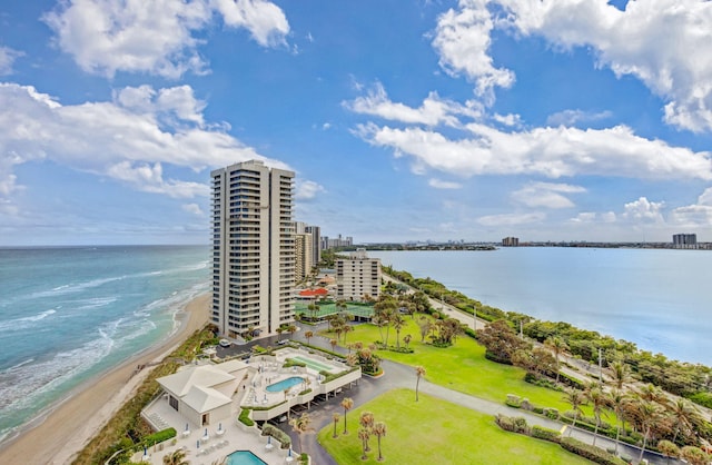 bird's eye view with a beach view and a water view