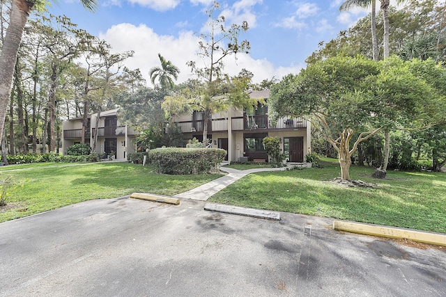 view of front of property with a front lawn