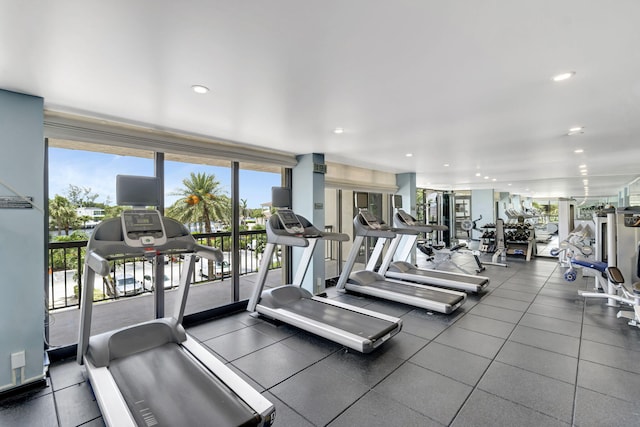 exercise room featuring expansive windows