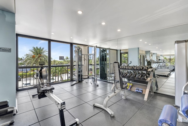 workout area featuring expansive windows