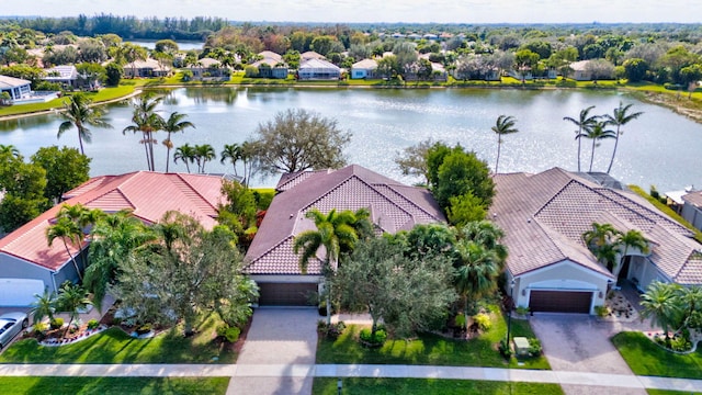 aerial view featuring a water view and a residential view