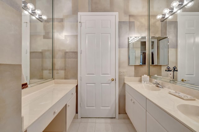 full bathroom featuring tile patterned floors, a sink, and double vanity