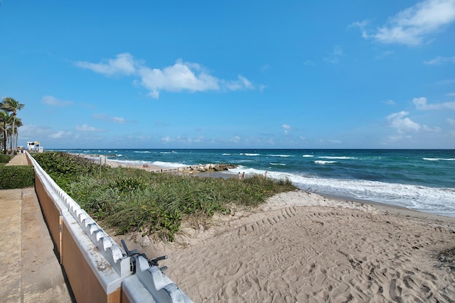 view of water feature with a beach view