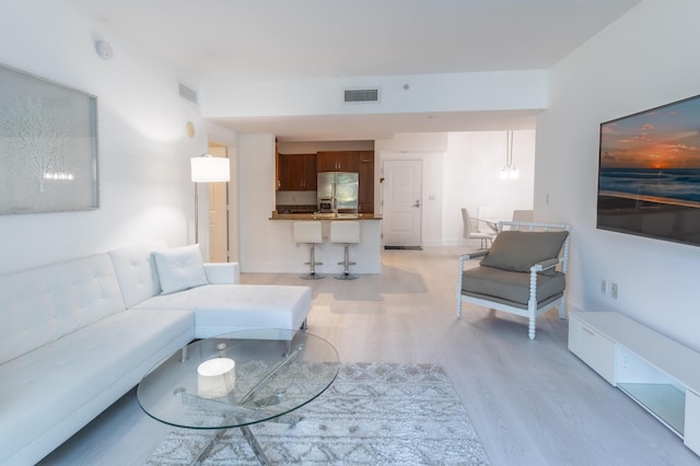 living room featuring light hardwood / wood-style flooring