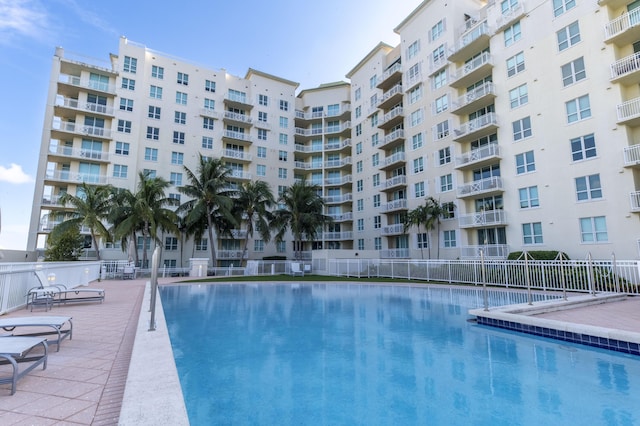 view of swimming pool with a patio area