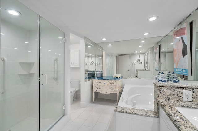 full bathroom featuring tile patterned floors, vanity, toilet, and shower with separate bathtub