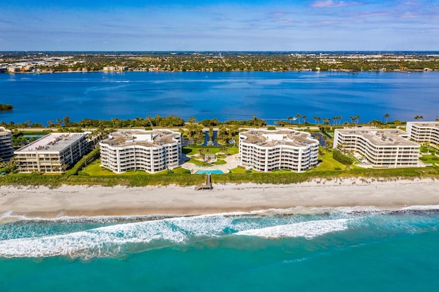 bird's eye view featuring a beach view and a water view