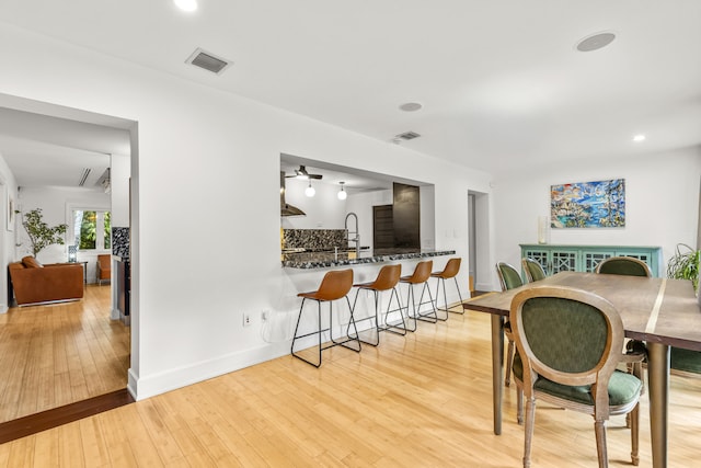 dining room featuring light wood-type flooring