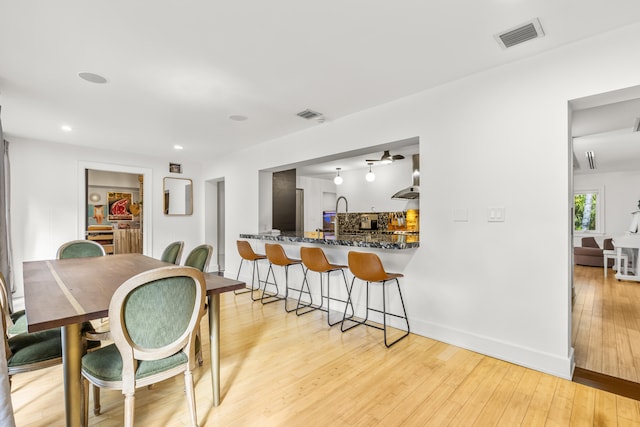 dining area featuring light hardwood / wood-style floors