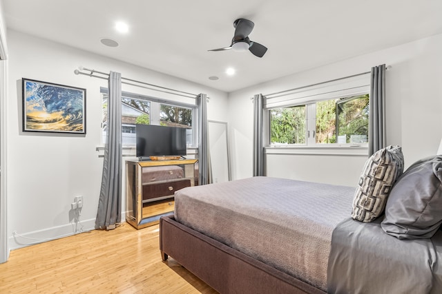 bedroom featuring ceiling fan and wood-type flooring