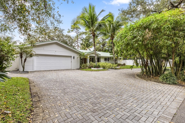 ranch-style home with a garage