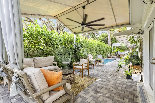 view of patio / terrace featuring ceiling fan